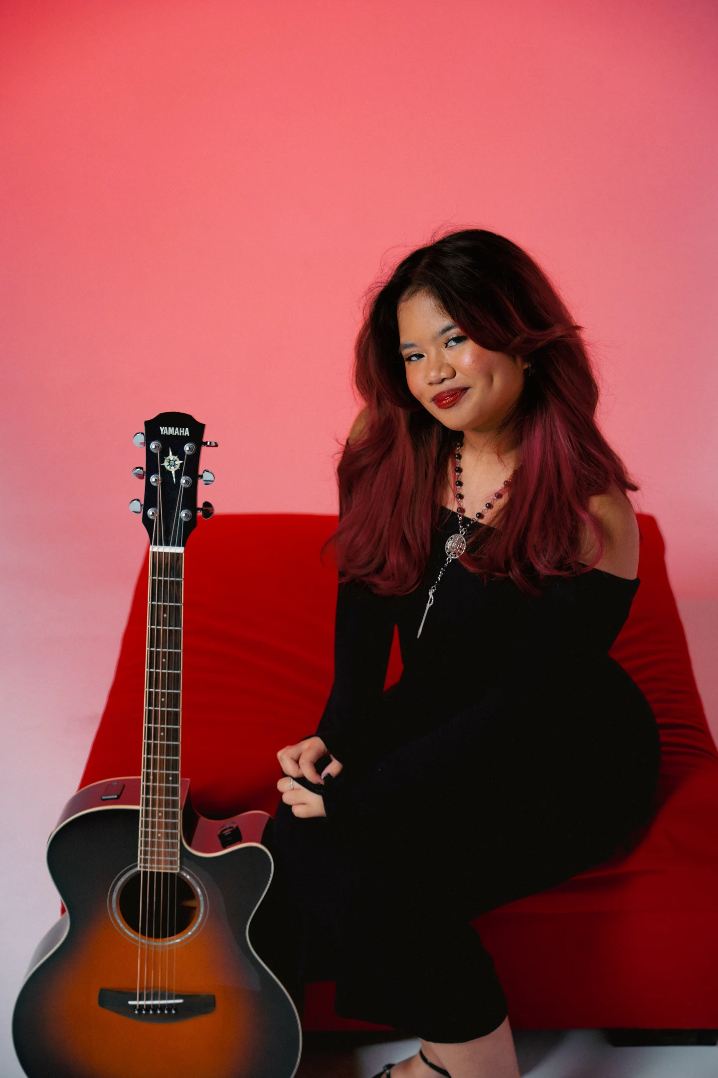 Baby Salma with her acoustic guitar